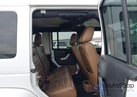 2012 Jeep Wrangler Unlimited Sahara z USA, uszkodzony, nr VIN 1C4BJWEG5CL142202